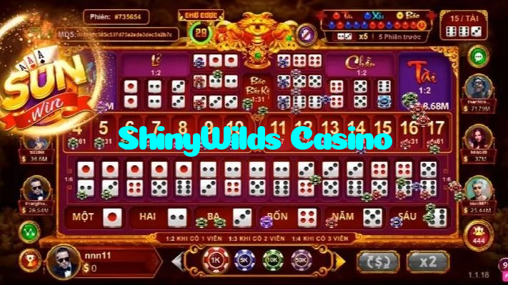 ShinyWilds Casino casino presented on mobile device in Pakistan with slots and live games